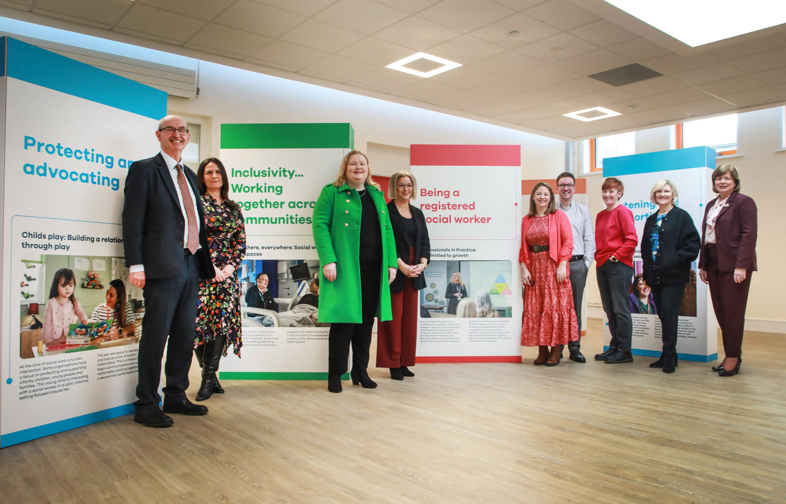 Pictured left to right at the launch of the ‘Holding space: Inside social work’ exhibition at North West Regional College are:
Gerry Guckian, Acting Chair, Social Care Council, Aisling Meenan Lecturer in Social Work, Ulster University, Tracy Reid, Chief Executive, Social Care Council, Mairead Quinn, Interim Assistant Director, Physical Disability and Specialist Services, Western Trust, Louise Frazer, NI Team Manager, NSPCC, Daniel Quinn, Head of Service: Learning, Development and Governance: Social Work, Western Trust, Caoimhe McDermott, Assistant Director for Social Work Services, Bryson Care, Lorna Ballard, National Director, Action for Children and Dr Catherine O'Mullan, Director of Curriculum and Academic Standards, North West Regional College.