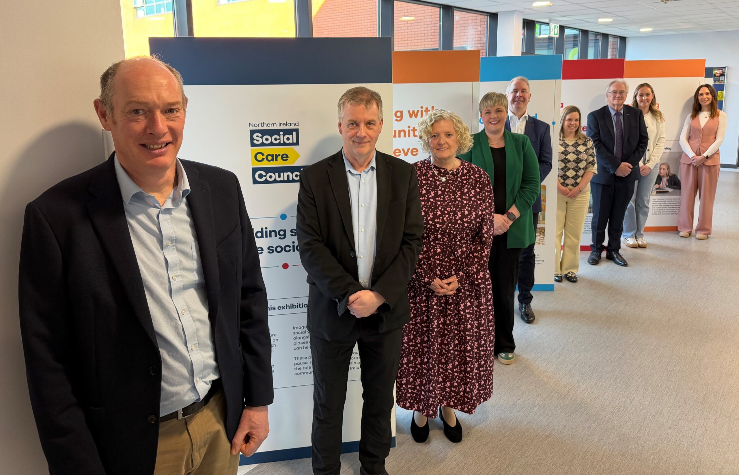 Pictured at the launch of the ‘Holding space: Inside social work’ Exhibition at South West College today at South West College (SWC) are (L-R): 

Dr John Moore, Head of Dept Health Life and Personal Sciences, SWC, Alastair McCarley, Head of School for Health and Social Care, SWC, Catherine Maguire, Co-Director Regulation and Standards (Interim) Social Care Council, Charlene Hill, Social Worker, St Ronan’s, Lurgan, Adrian Nugent, Head of Education Welfare Service, Education Authority, Dianne Calvert, Early Years Social Worker, Southern Health and Social Care Trust, Terence McLaughlin, Area Manager, Probation Board for Northern Ireland, Social work student, SWC and Alexandra (Ally) Robinson, Fostering Social Worker, Action for Children. 
